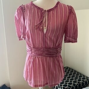 Pink and white Tory Burch